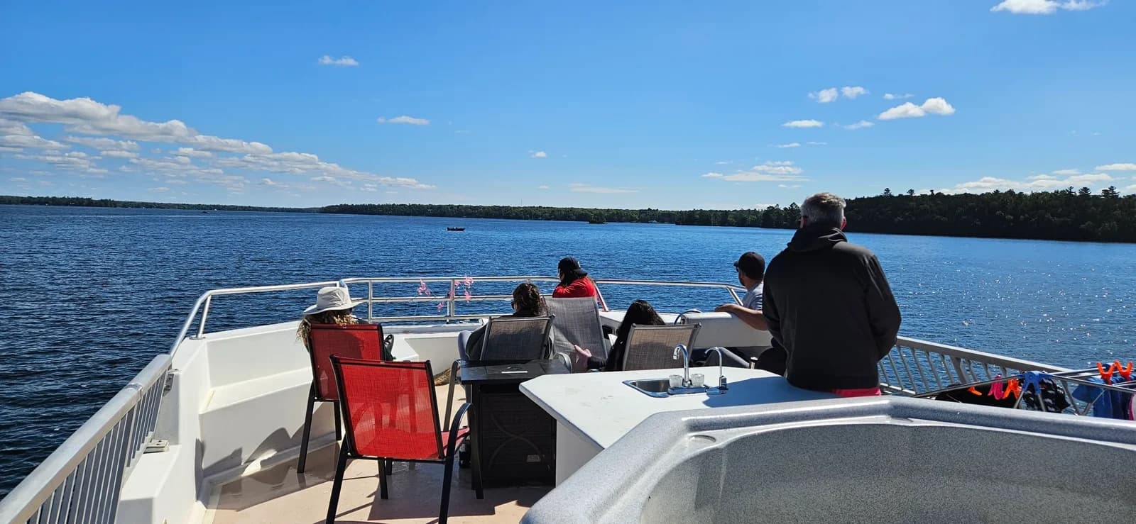 Family enjoying their first houseboat vacation